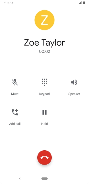 Press the end call icon.