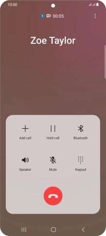 Press the end call icon.