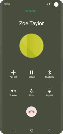 Press the end call icon.