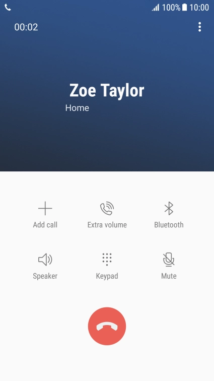 Press the end call icon.