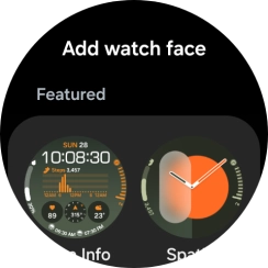 Slide your finger up or down to see the available watch faces.