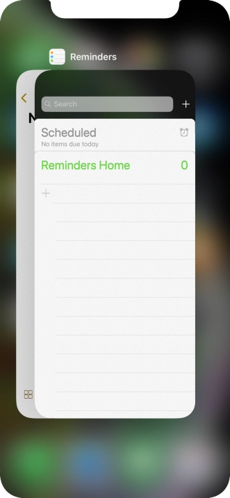 Slide upwards on the required application to end it.