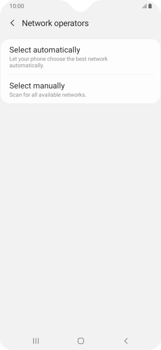 Press Select manually and your phone will search for networks.