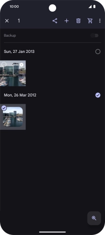 Press the required pictures or videos to select them.