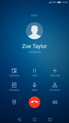 Press the end call icon.