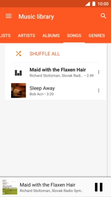 Press the song title at the bottom of the screen.