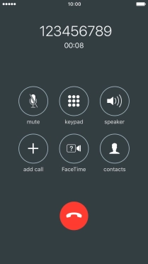 Press the end call icon.