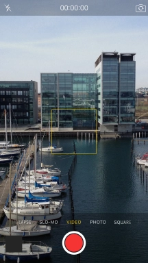 Slide your finger right or left on the screen to select PHOTO.