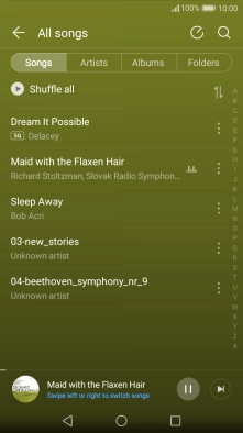 Press the song title at the bottom of the screen.