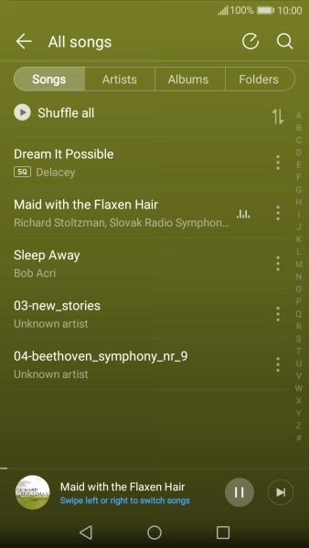 Press the song title at the bottom of the screen.