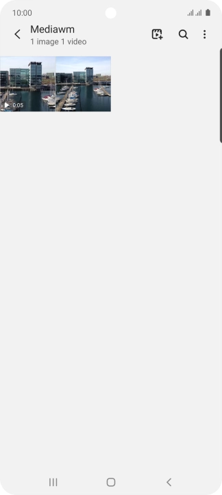 Press and hold any picture or video clip.