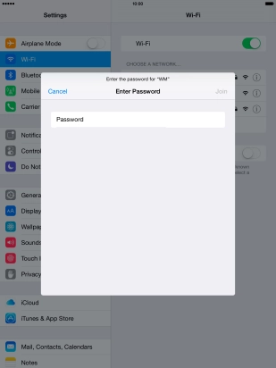 Press Password and key in the password for the Wi-Fi network.