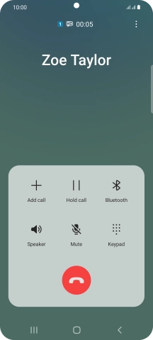 Press the end call icon.