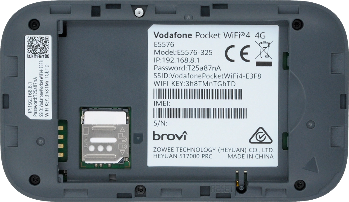 Slide the cover for the SIM holder upwards and open it.