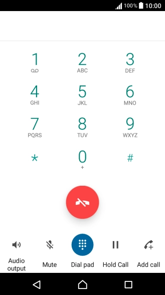 Press the end call icon.