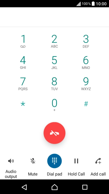 Press the end call icon.