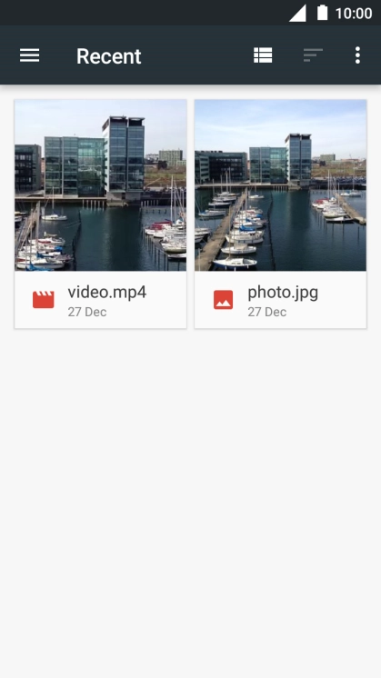 Slide your finger right starting from the left side of the screen.