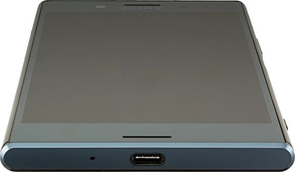 Connect the data cable to the socket and to your computer's USB port.