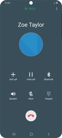 Press the end call icon.