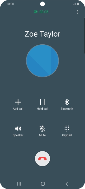 Press the end call icon.