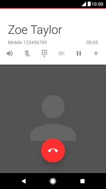 Press the end call icon.