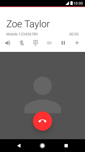 Press the end call icon.