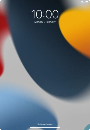 Slide your finger upwards starting from the bottom of the screen.