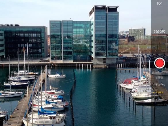 Slide your finger right or left on the screen to select PHOTO.