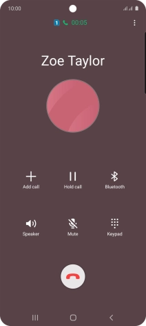 Press the end call icon.