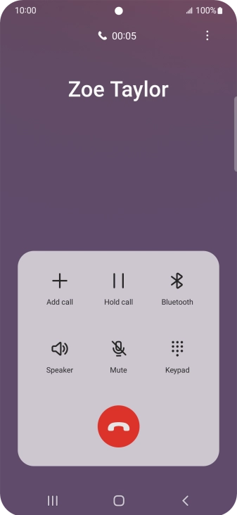 Press the end call icon.