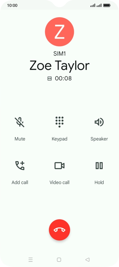 Press the end call icon.