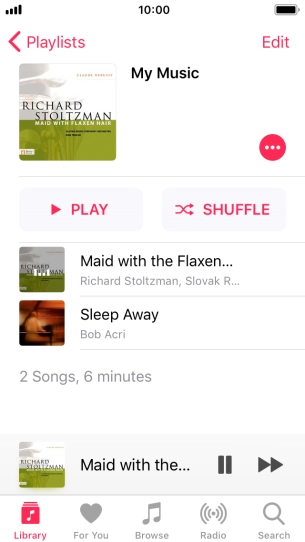 Press the song title at the bottom of the screen.