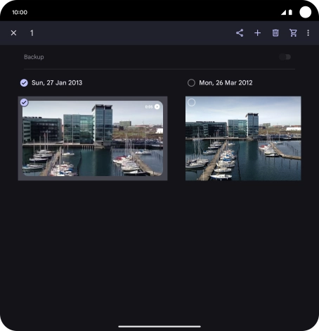 Press the required pictures or videos to select them.