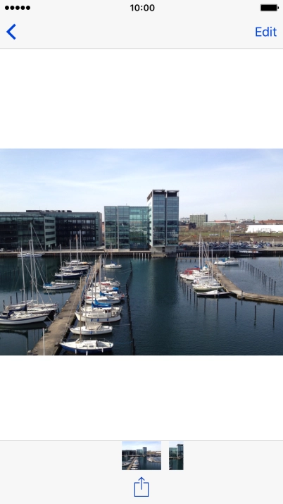 Make sure the other device is turned on and is ready to connect via AirDrop. Press the share icon.