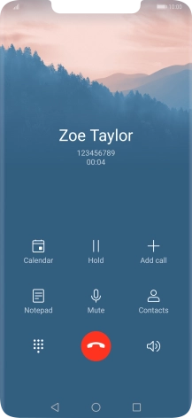 Press the end call icon.