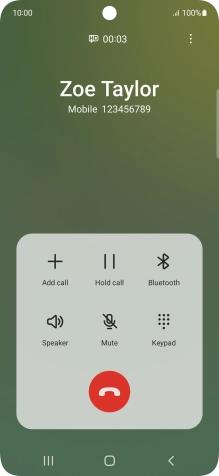 Press the end call icon.