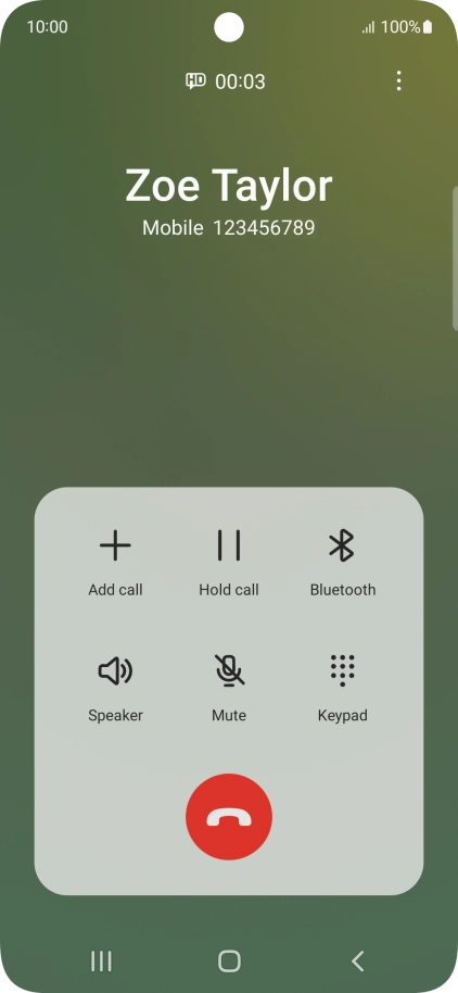 Press the end call icon.