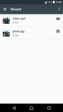 Slide your finger right starting from the left side of the screen.