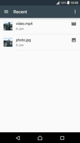Slide your finger right starting from the left side of the screen.
