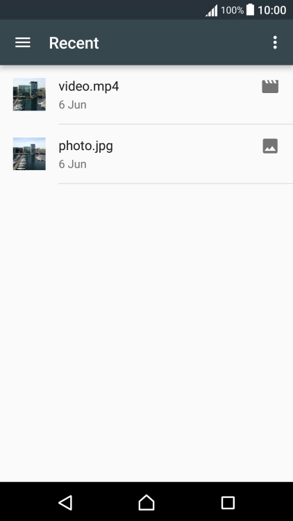 Slide your finger right starting from the left side of the screen.