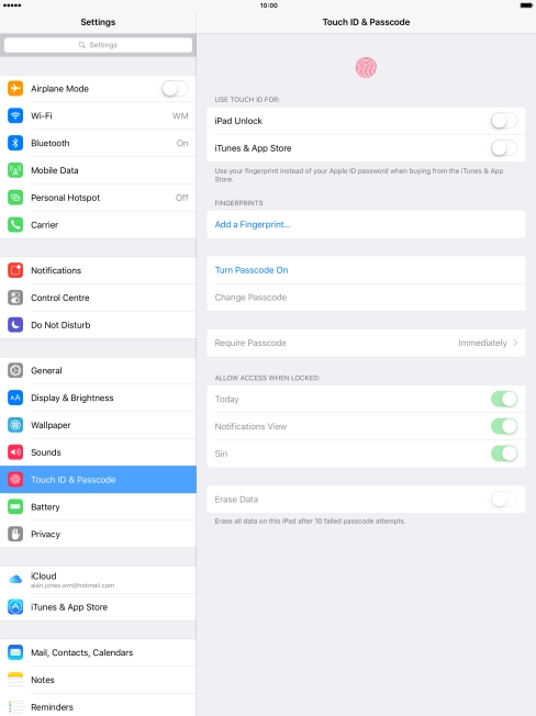 Press Turn Passcode On and key in a lock code of your own choice twice.