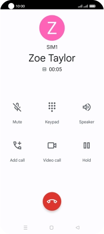 Press the end call icon.