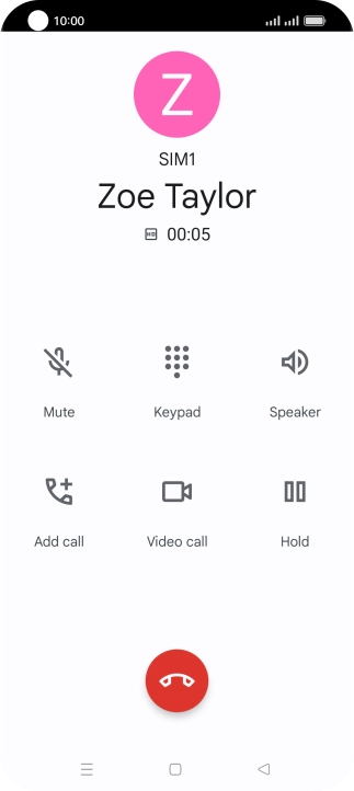 Press the end call icon.