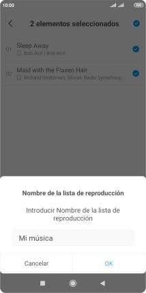 Introduce el nombre deseado de la lista de reproducción y pulsa OK.