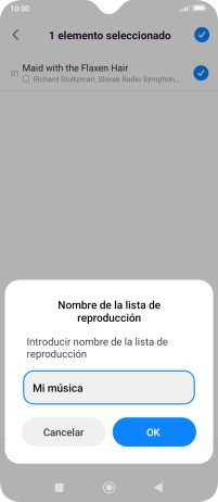 Introduce el nombre deseado de la lista de reproducción y pulsa Aceptar.