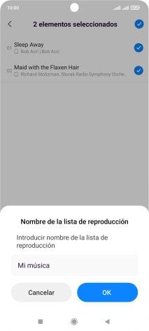 Introduce el nombre deseado de la lista de reproducción y pulsa OK.