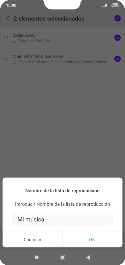 Introduce el nombre deseado de la lista de reproducción y pulsa OK.