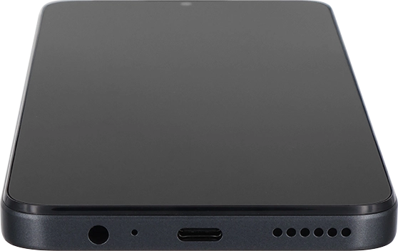 Conecta el cargador al conector y enchúfalo a una toma de corriente.