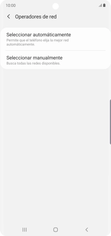 Pulsa Seleccionar manualmente y espera mientras el teléfono está buscando redes.