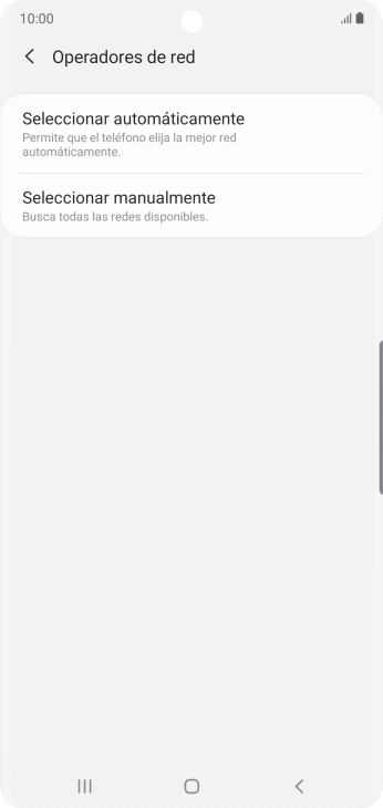 Pulsa Seleccionar manualmente y espera mientras el teléfono está buscando redes.